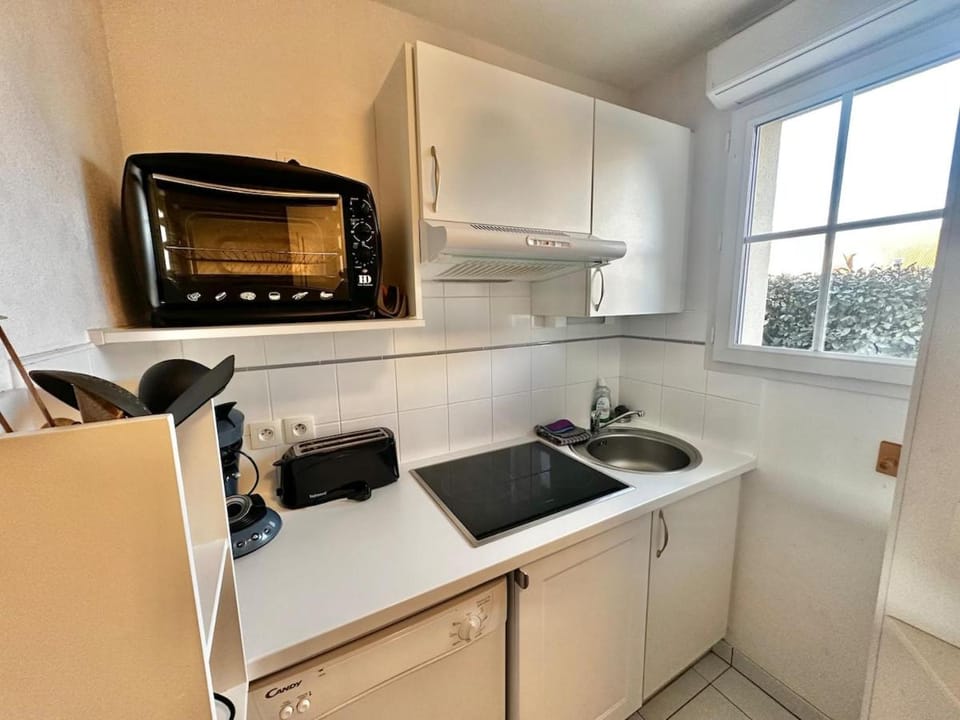 Kitchen or kitchenette, oven, stove, toaster