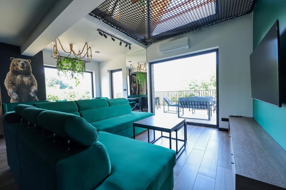 Communal lounge/ TV room, Living room, Seating area, air conditioner