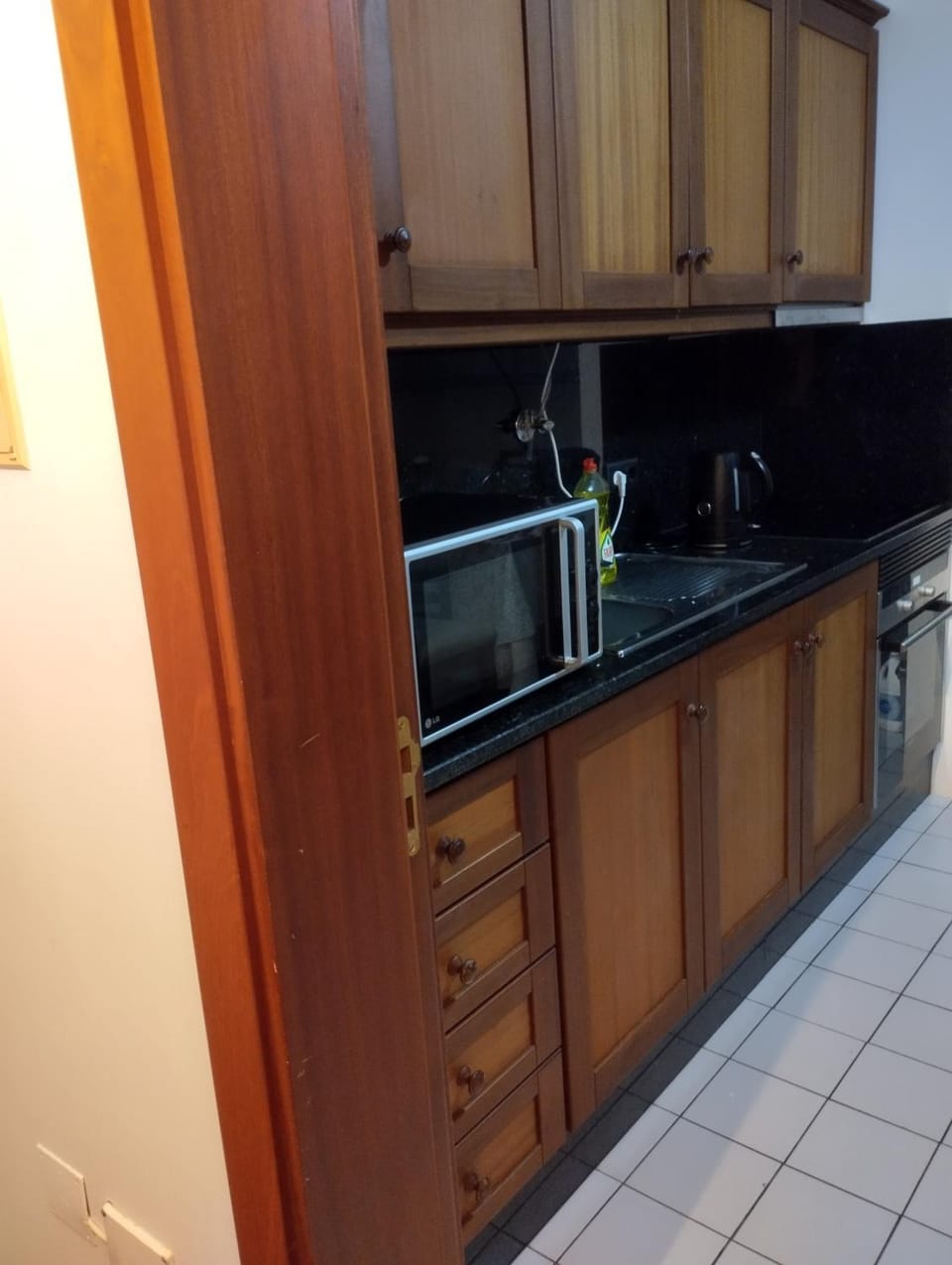 Kitchen or kitchenette, oven, stove