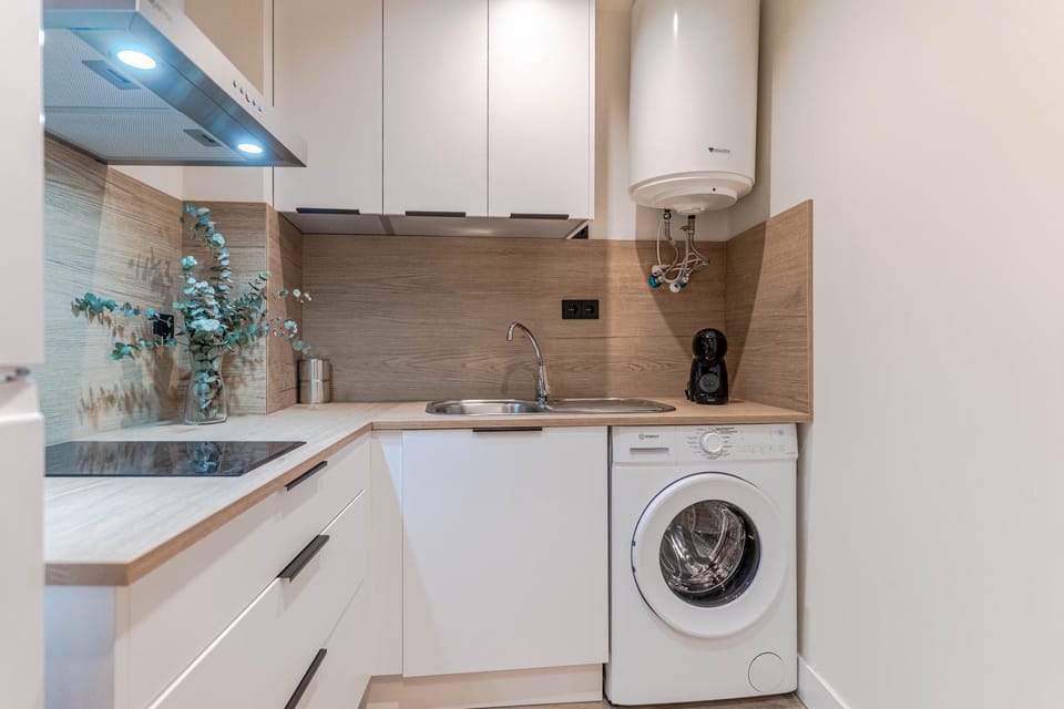 Kitchen or kitchenette, dishwasher, stove, washing machine