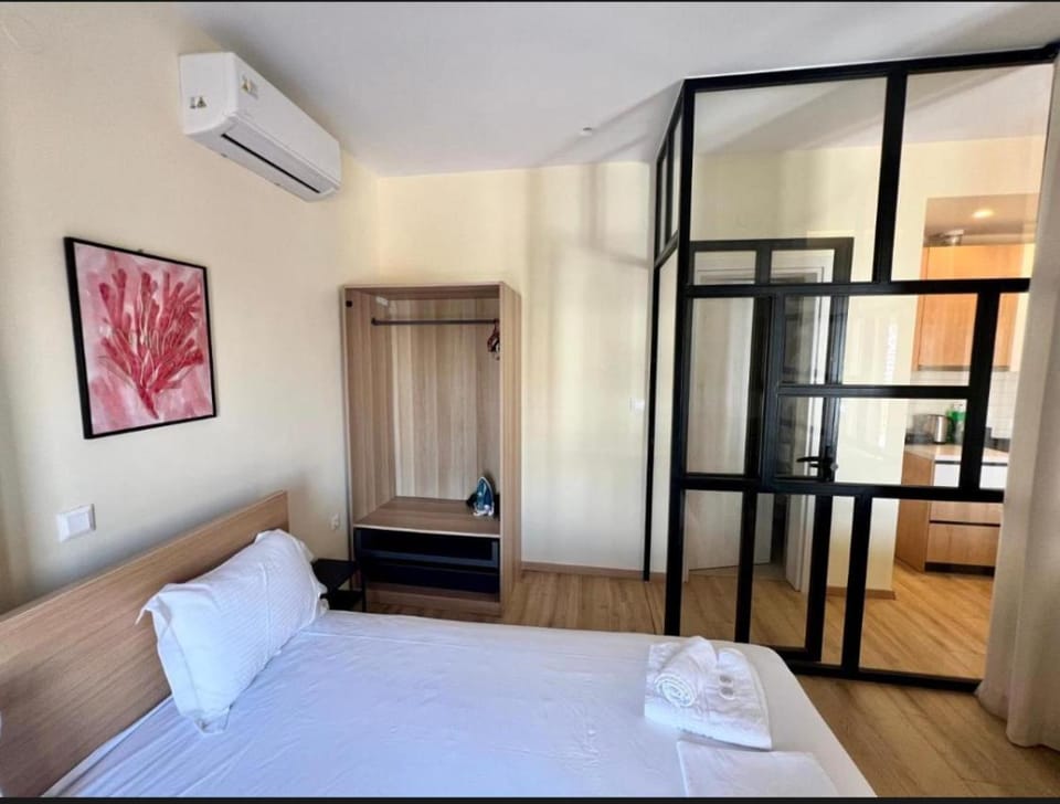 Bedroom, towels, air conditioner