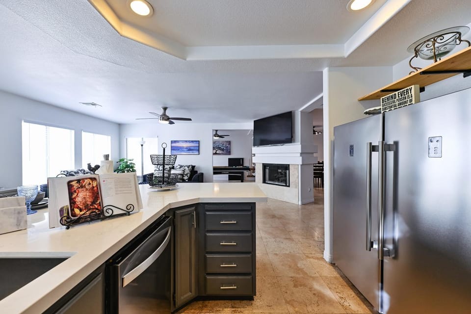 Kitchen or kitchenette, dishwasher, oven, stove