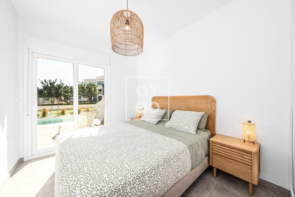 Pilar Poolside Living, luxury swim-up apt, ground-floor - by Oyoostays Apartment in Pilar de la Horadada