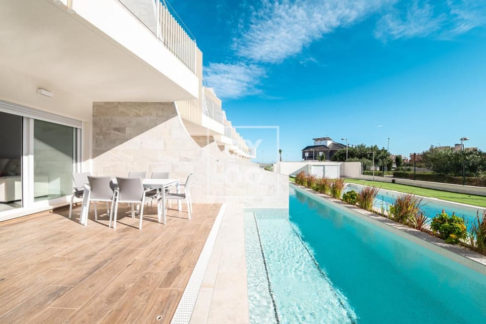 Pilar Poolside Living, luxury swim-up apt, ground-floor - by Oyoostays Apartment in Pilar de la Horadada