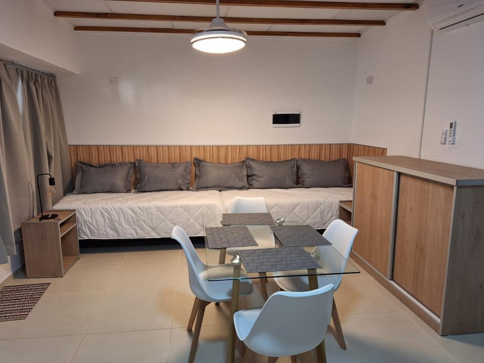 Bed, Living room, Seating area, Dining area, Bedroom