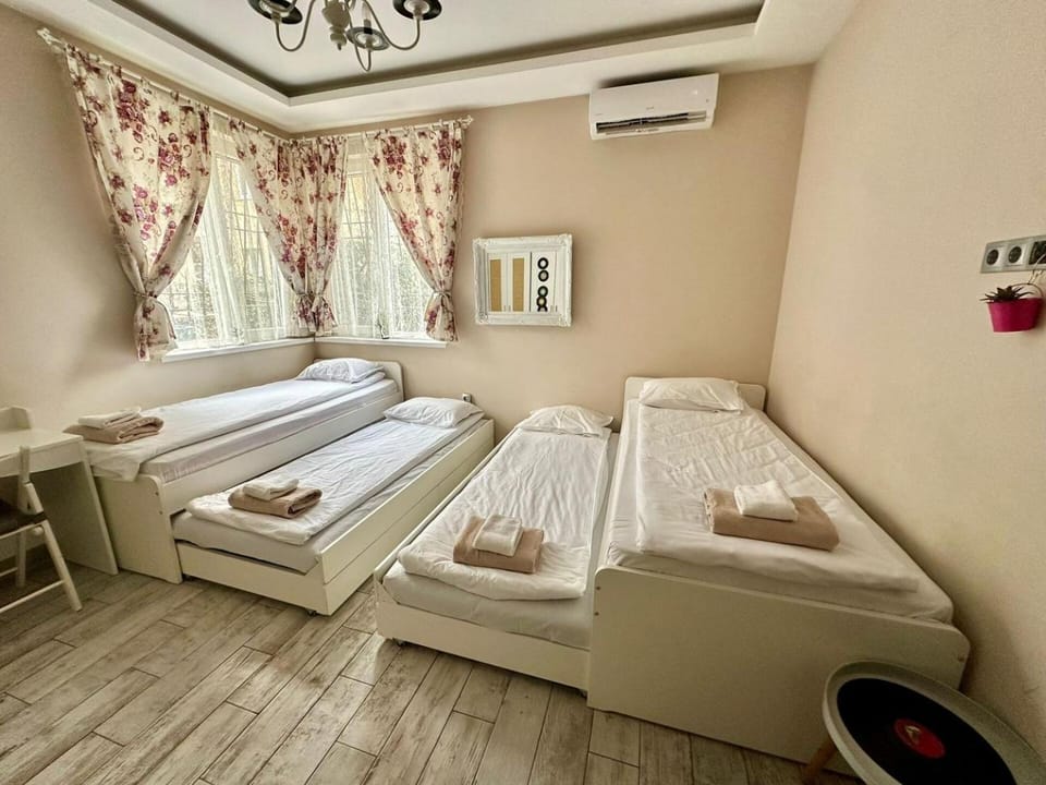 Photo of the whole room, Bedroom, towels, air conditioner