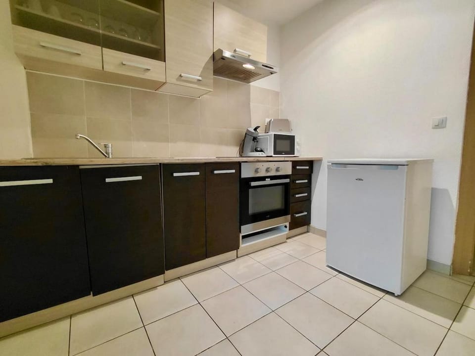 C Coispine 1 Cosy studio RDC vue sur la Meuse Apartment in Grand Est