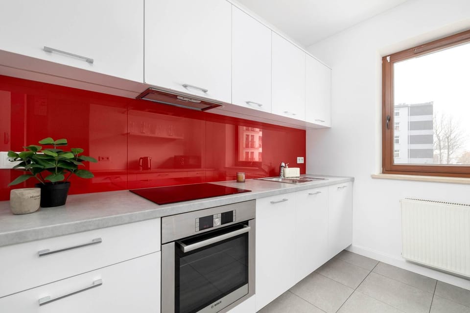 Kitchen or kitchenette, dishwasher, oven, stove