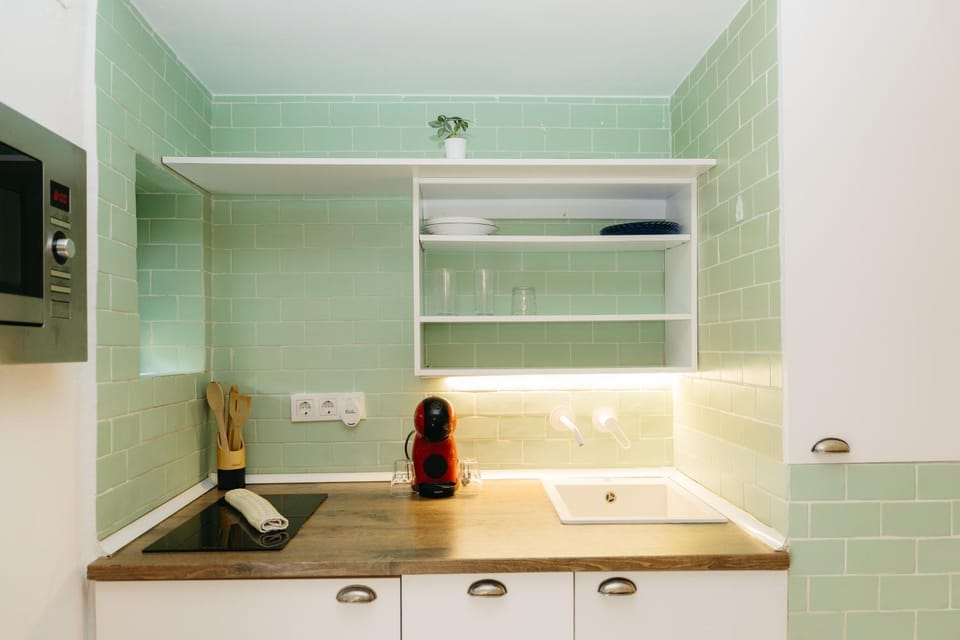 Kitchen or kitchenette, microwave, stove, kitchen