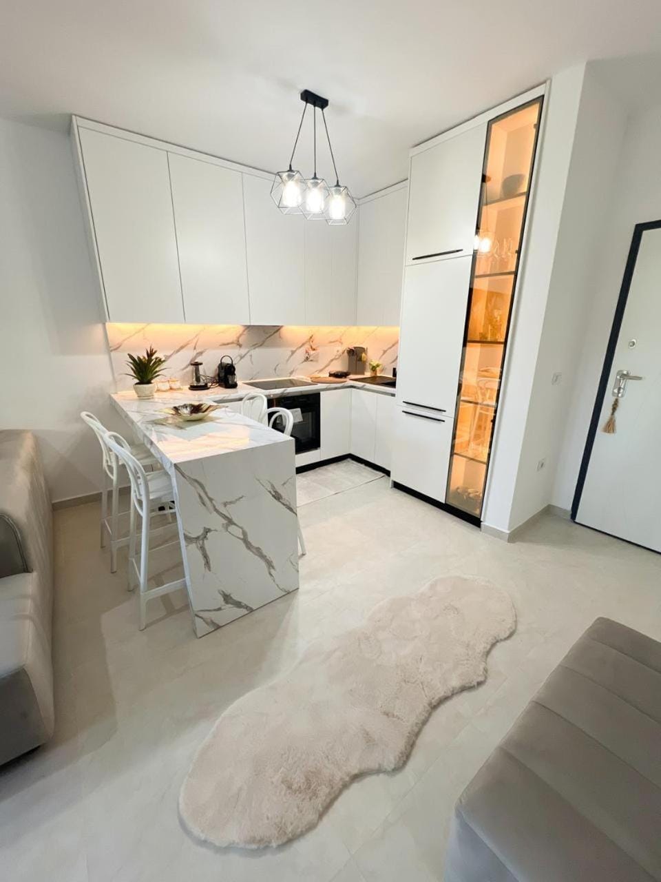 Kitchen or kitchenette, Living room, Seating area, Dining area