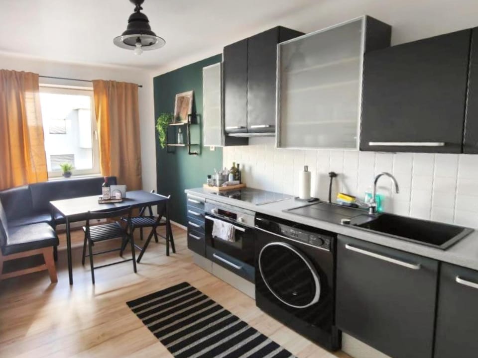 Kitchen or kitchenette, Dining area, oven, stove, washing machine