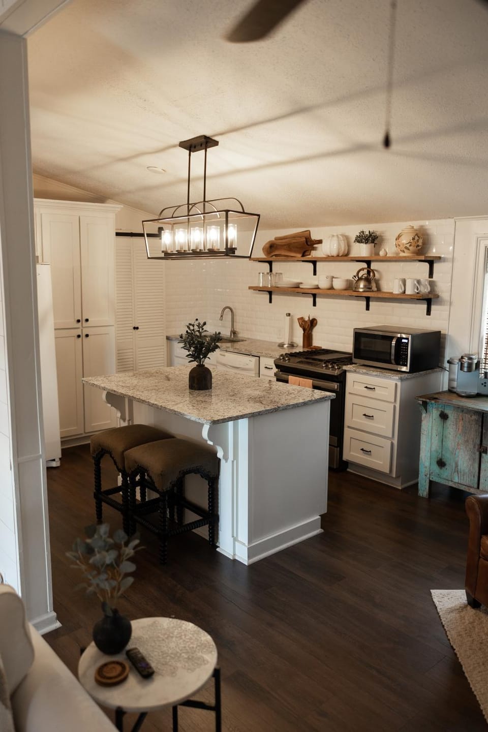Kitchen or kitchenette, dishwasher, oven, stove