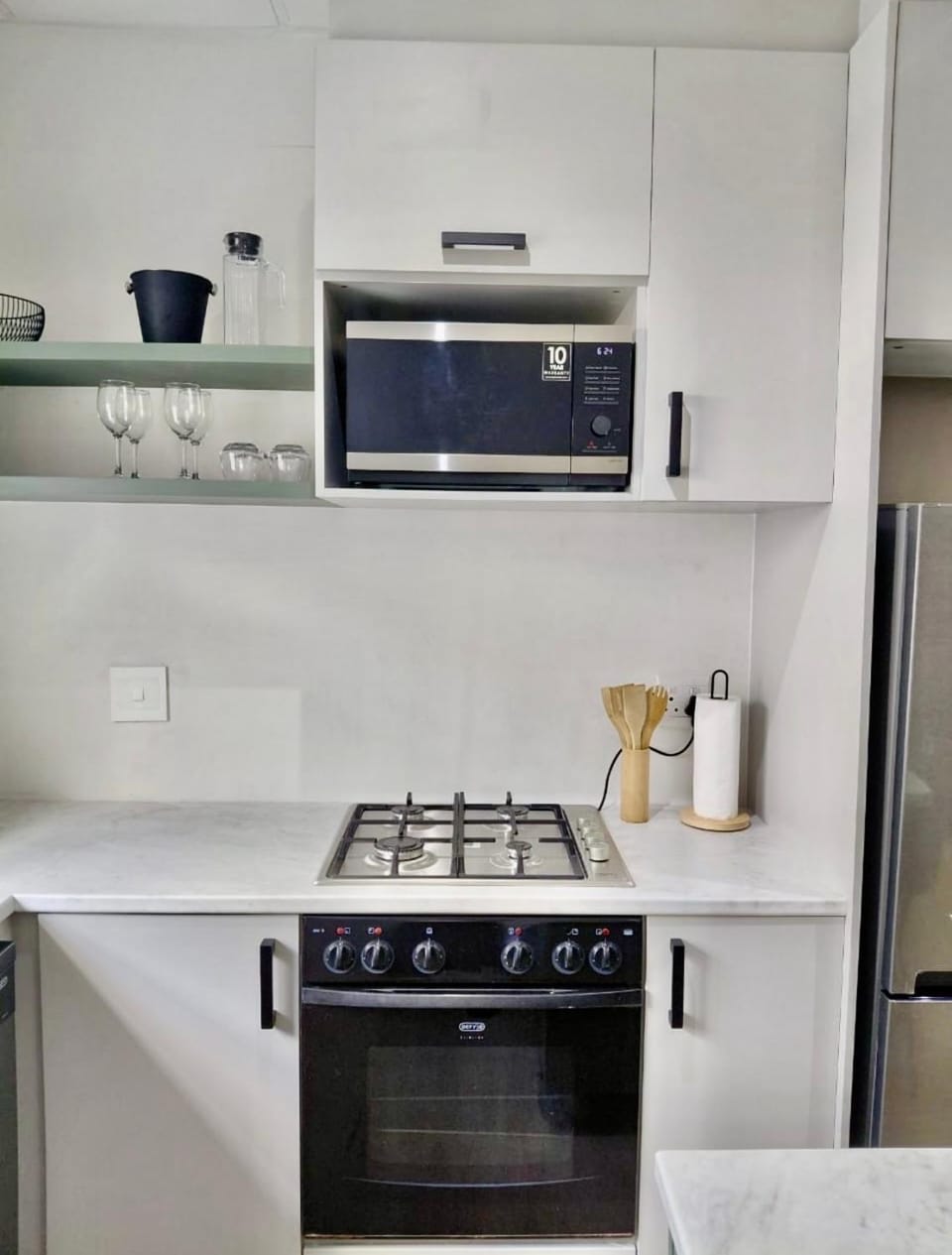 Kitchen or kitchenette, stove