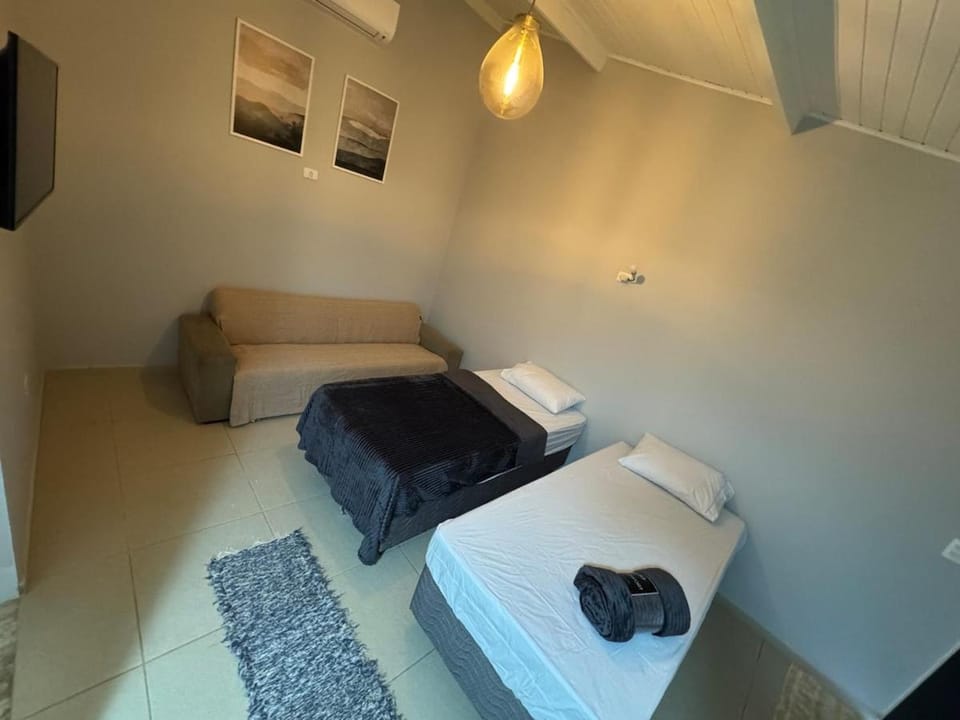 Loft com ar condicionado e cozinha na praia de Toque Toque Grande House in São Sebastião