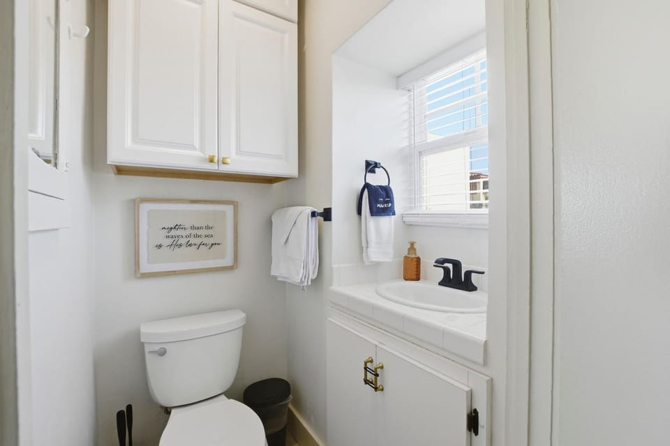Toilet, Bathroom, hair dryier, towels