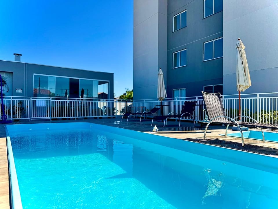 Property building, Pool view, Swimming pool, sunbed