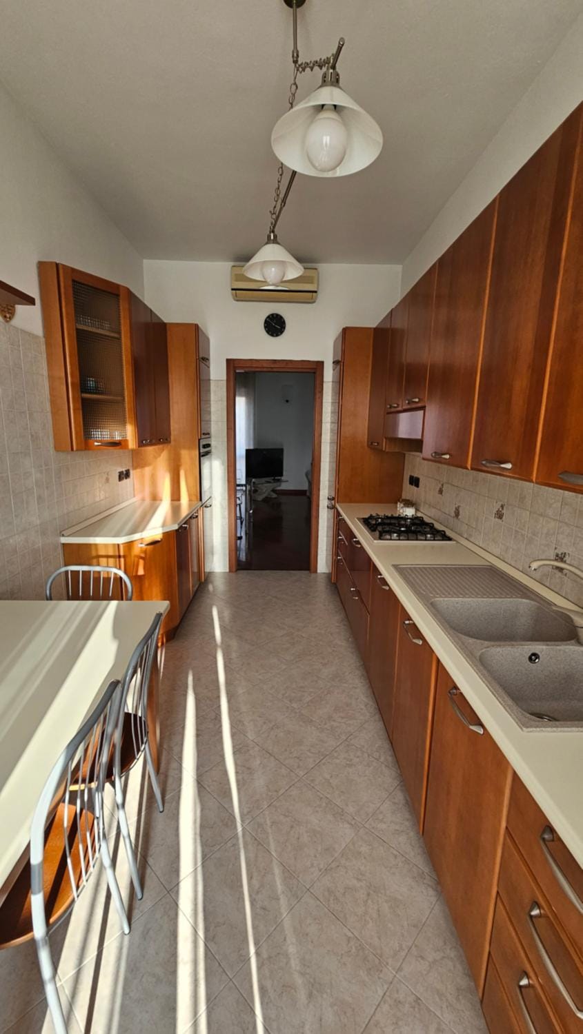 Kitchen or kitchenette, dishwasher, stove