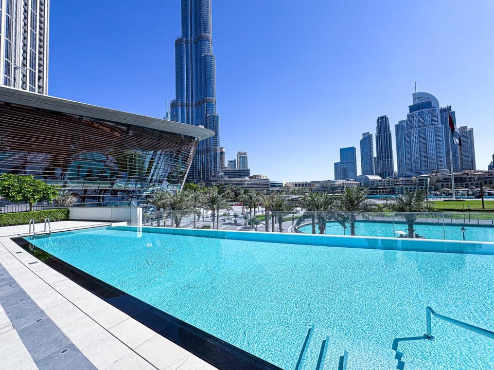 GRANDE SIGNATURE RESIDENCES with Burj Khalifa balcony view and Private Fountain Show with DXB AIRPORT VIP Shuttle option Apartment in Dubai