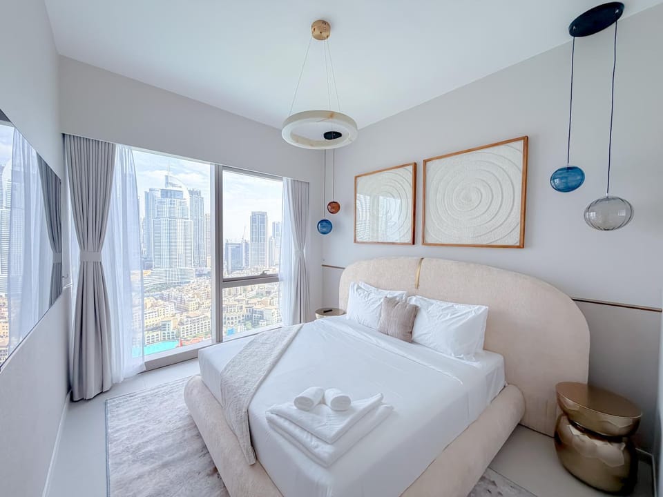 GRANDE SIGNATURE RESIDENCES with Burj Khalifa balcony view and Private Fountain Show with DXB AIRPORT VIP Shuttle option Apartment in Dubai