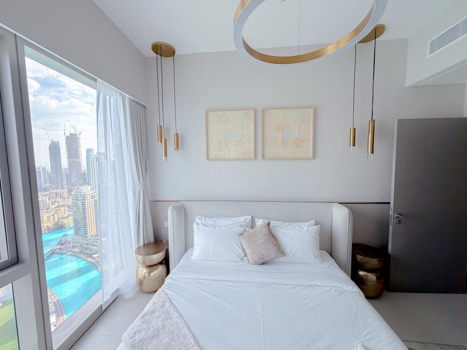 GRANDE SIGNATURE RESIDENCES with Burj Khalifa balcony view and Private Fountain Show with DXB AIRPORT VIP Shuttle option Apartment in Dubai