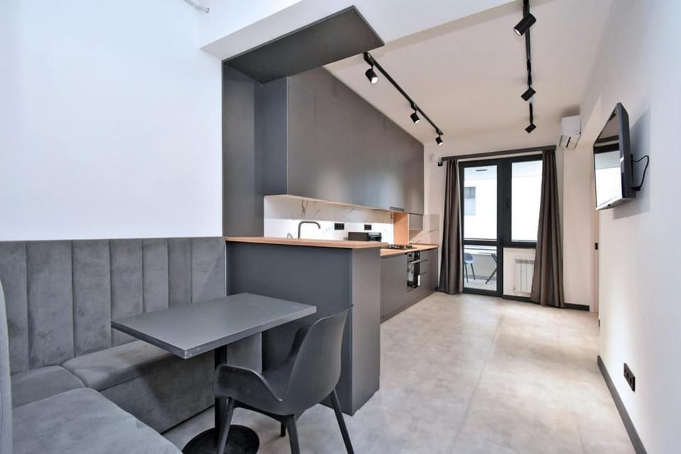 Kitchen or kitchenette, Living room, Seating area, Dining area