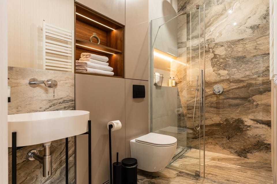 Shower, Toilet, hair dryier, heating, towels