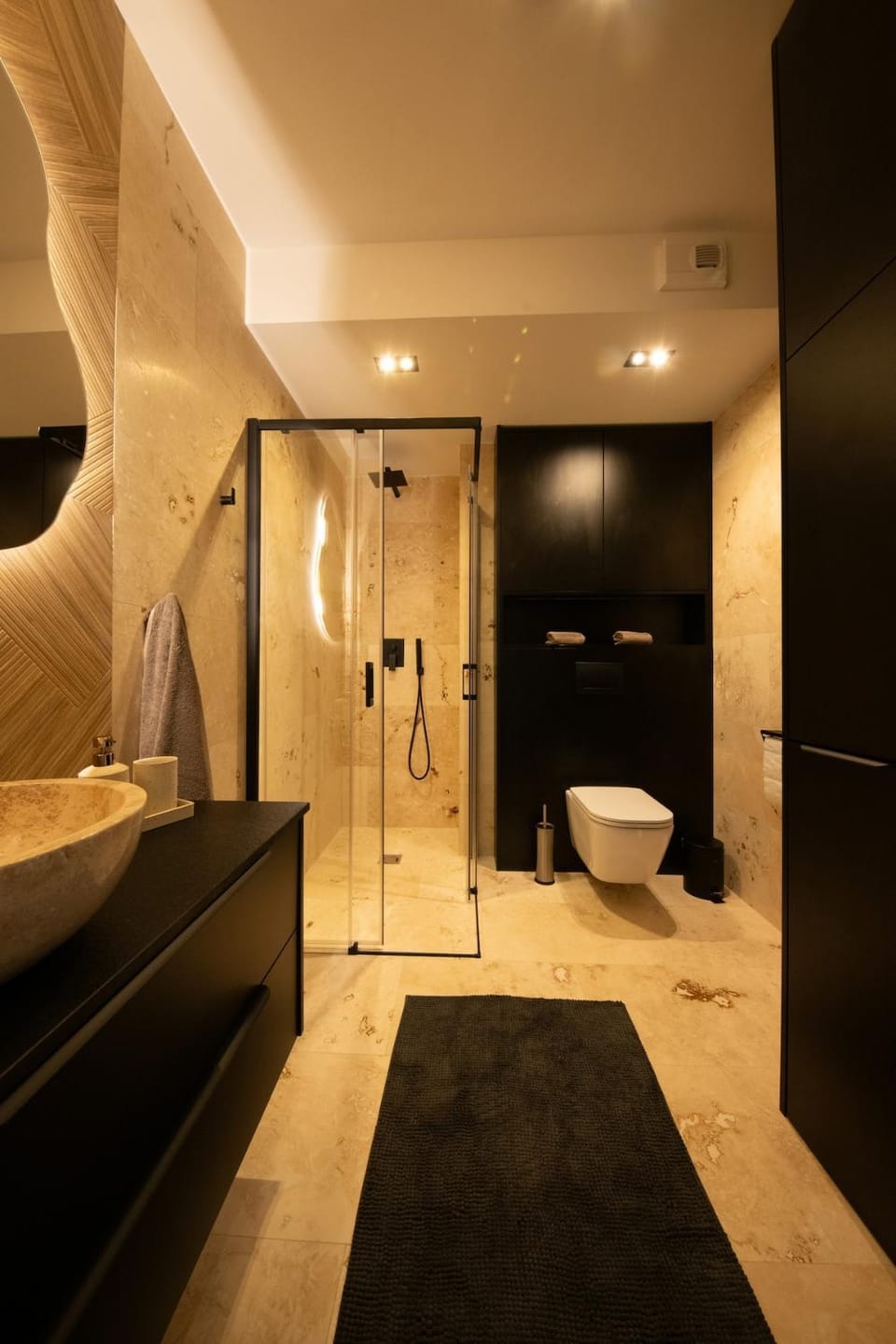 Shower, Toilet, hair dryier, towels, washing machine