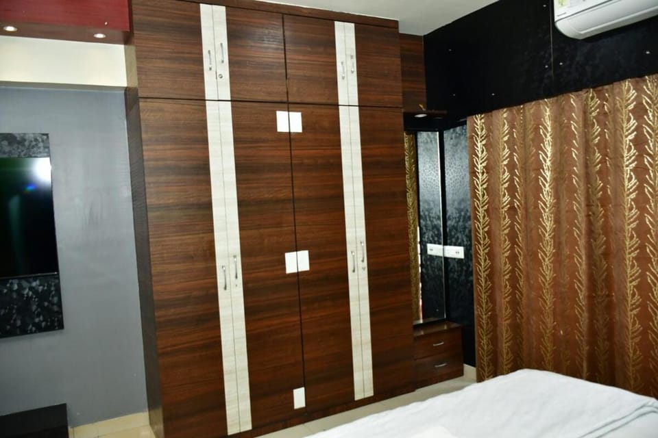 Premium room suite near Airport CC2 Ecopark Apartment in Kolkata