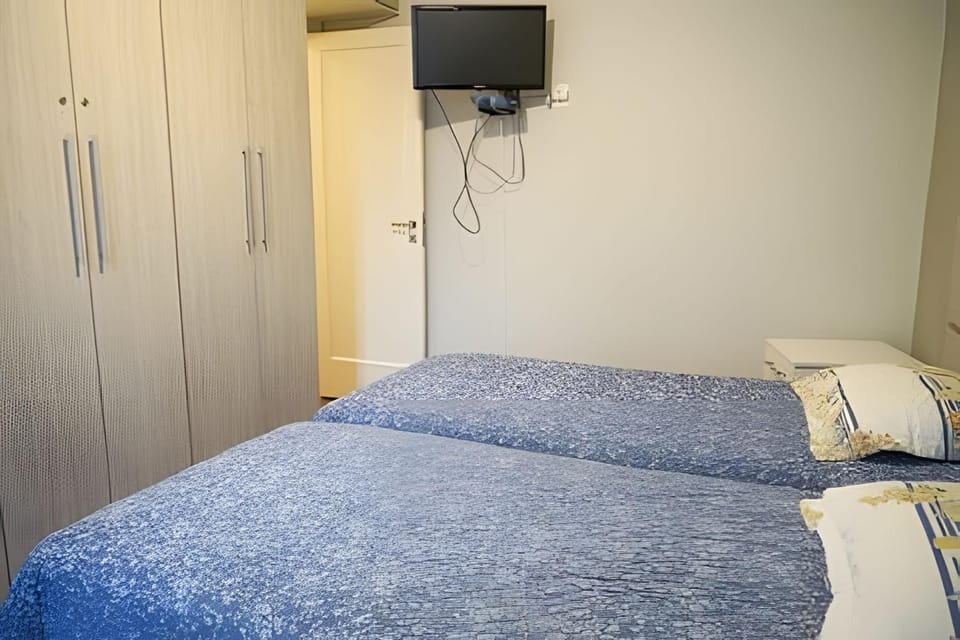Scl206| Modern bedroom and living room in Botafogo Apartment in Santa Teresa