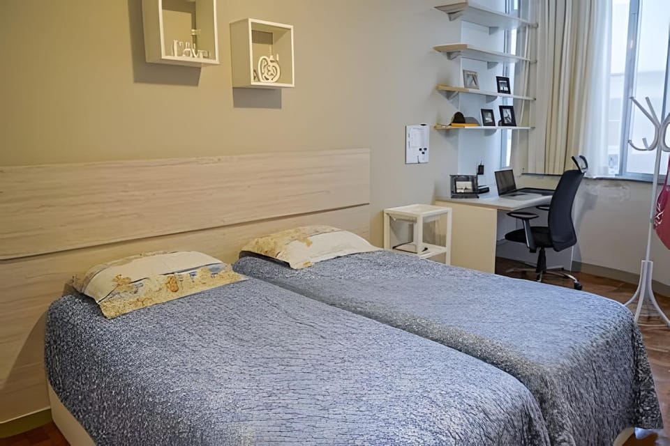Scl206| Modern bedroom and living room in Botafogo Apartment in Santa Teresa