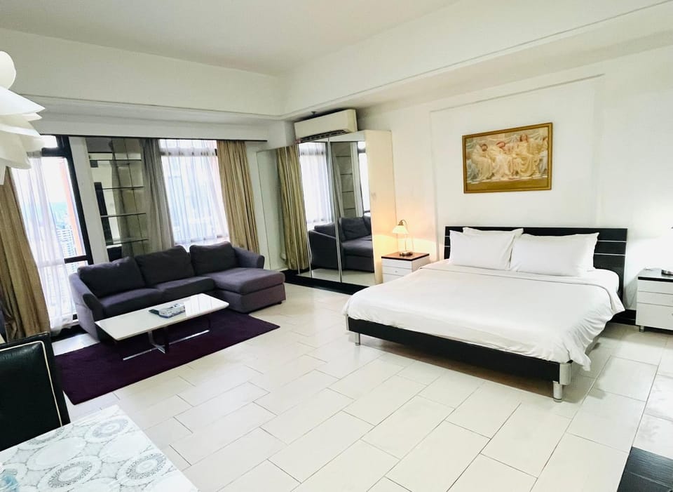 Bed, Living room, Seating area, Bedroom, towels, air conditioner