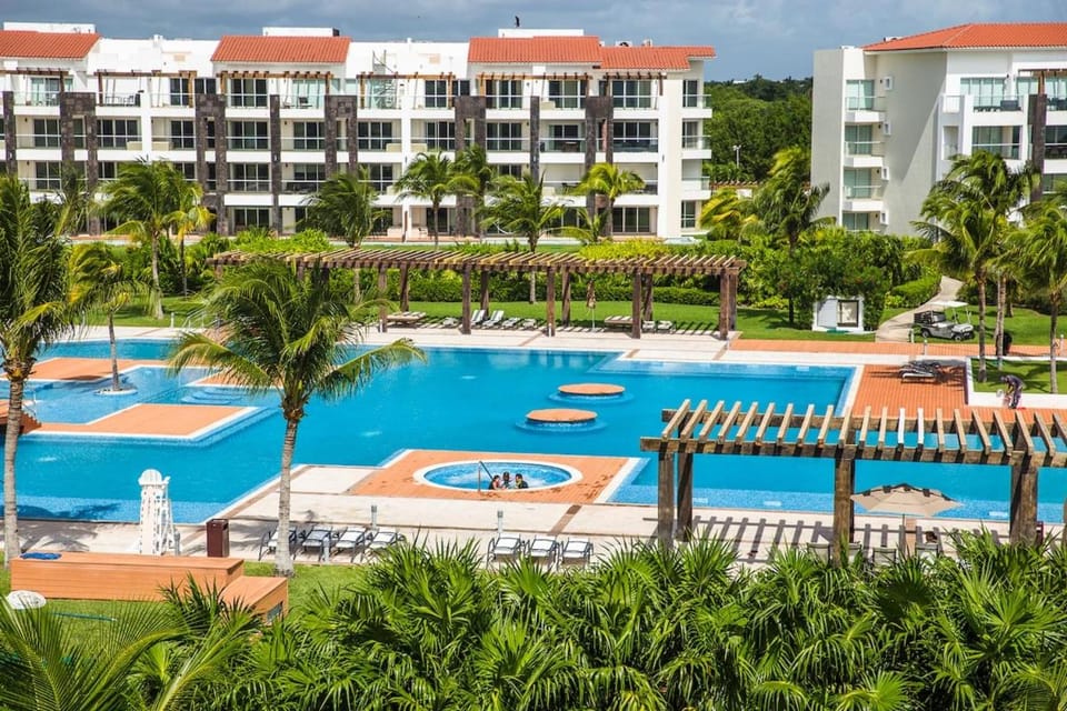 Resort-Style Pool & Private Beach with Ocean View Apartment in Playa del Carmen