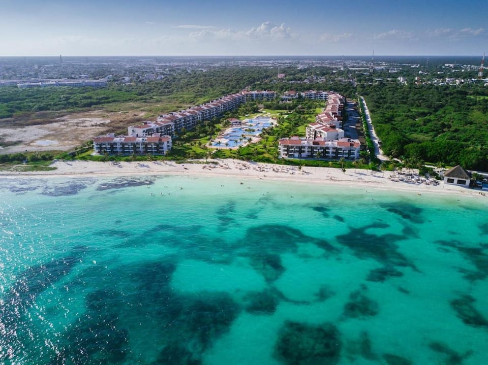 Resort-Style Pool & Private Beach with Ocean View Apartment in Playa del Carmen
