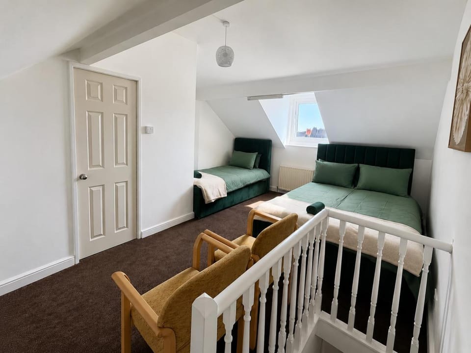 Bed, Bathroom, Seating area, Bedroom, towels