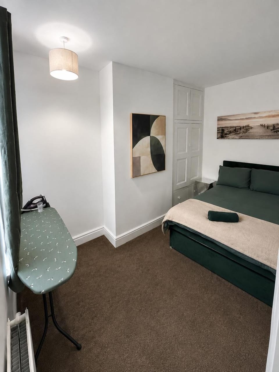 Bed, Bedroom, flat iron, hair dryier, towels, wardrobe
