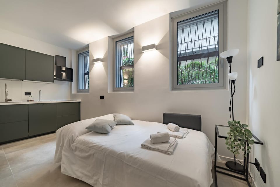 Bed, Kitchen or kitchenette, towels