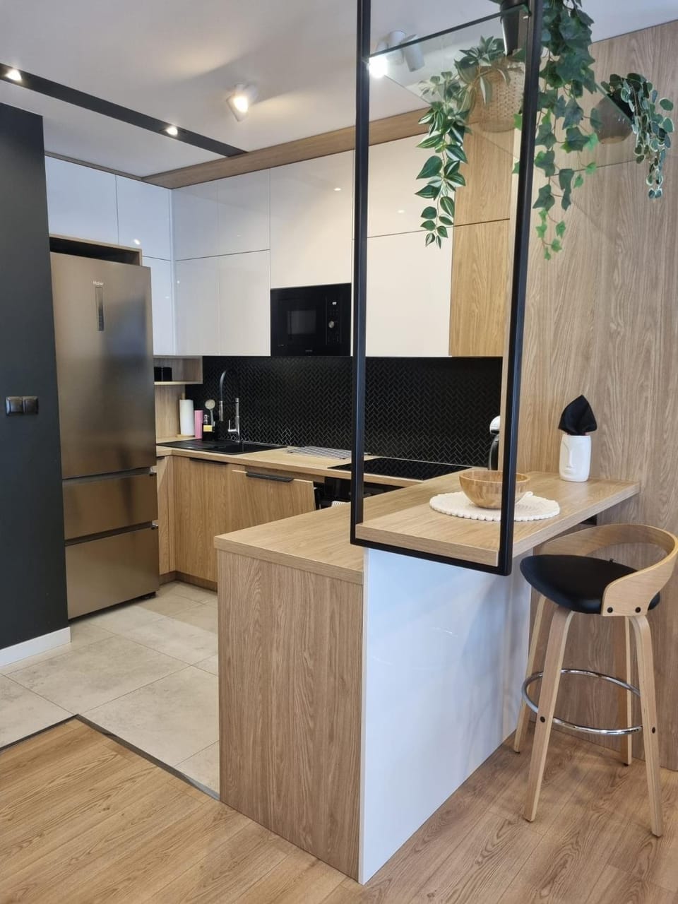 Kitchen or kitchenette, dishwasher, furniture, microwave, stove, kitchen