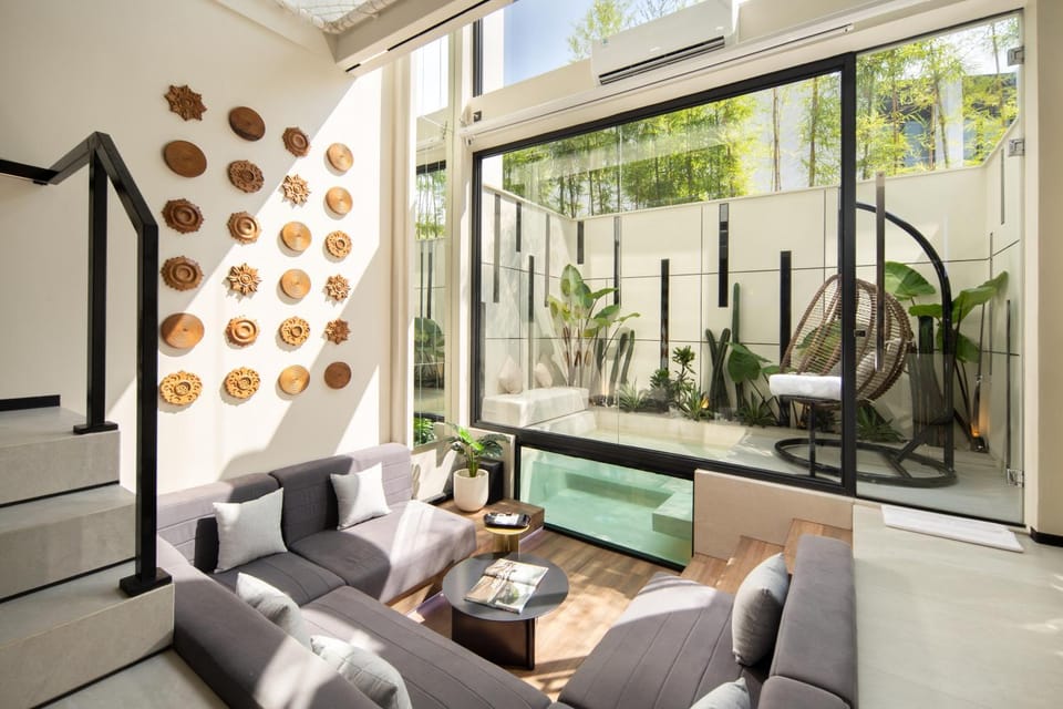 Living room, Seating area, Pool view