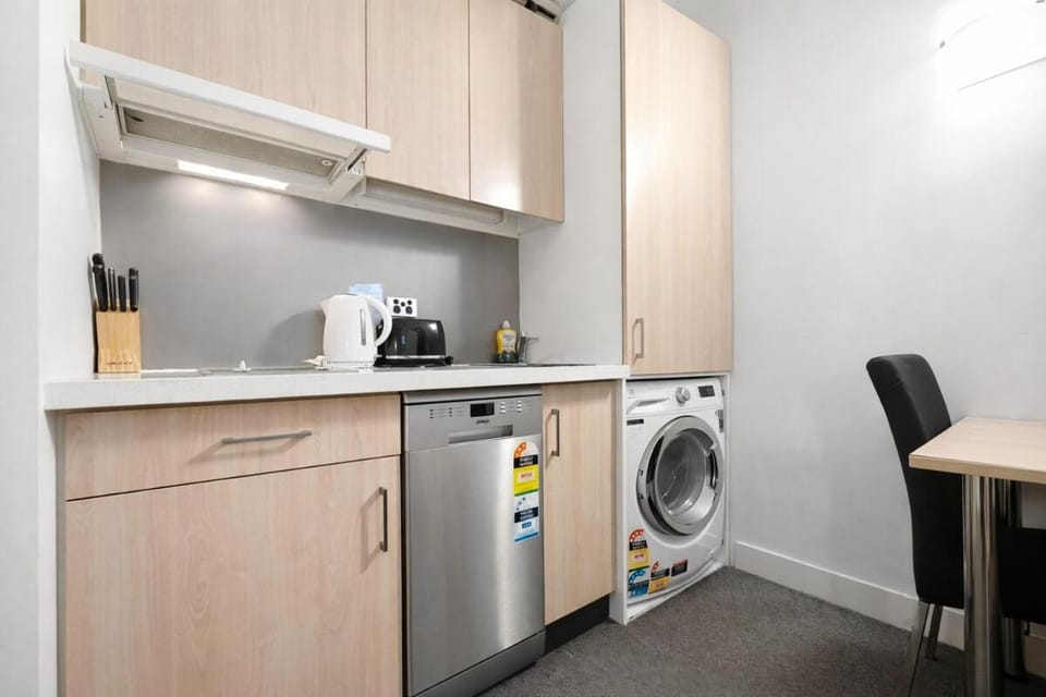 CBD Bank Place Centennial Historic Building Core One Bedroom One Bathroom Apartment 4m Ceiling Height Double Brick Wall Featured Bar Food Downstairs Apartment in Melbourne