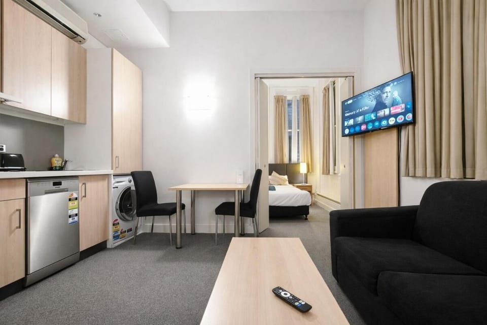CBD Bank Place Centennial Historic Building Core One Bedroom One Bathroom Apartment 4m Ceiling Height Double Brick Wall Featured Bar Food Downstairs Apartment in Melbourne