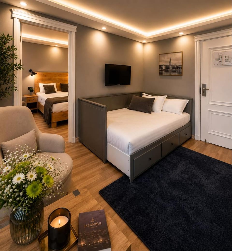Bed, TV and multimedia, Living room, Seating area, Bedroom