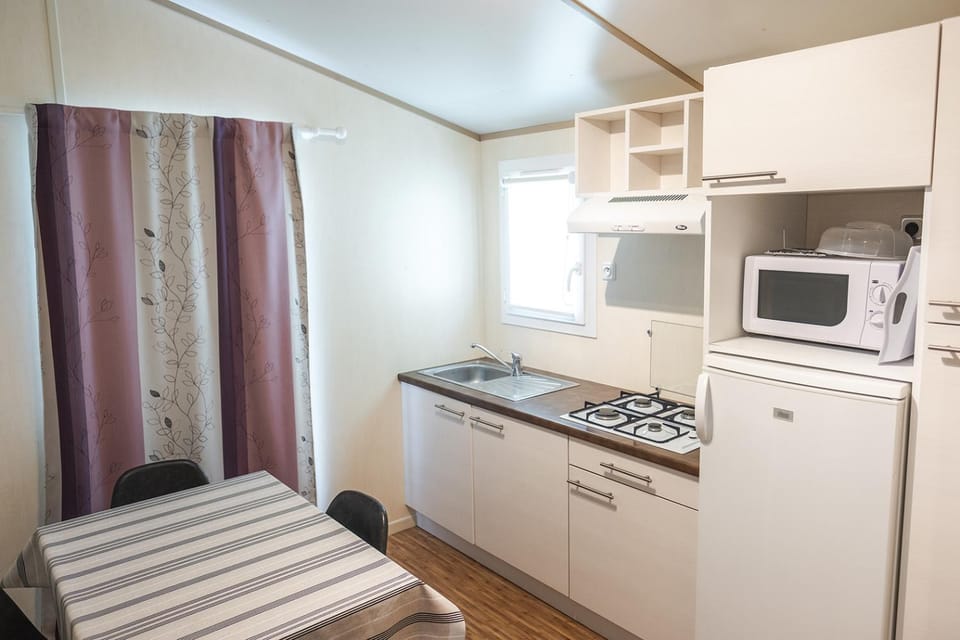 Kitchen or kitchenette, stove
