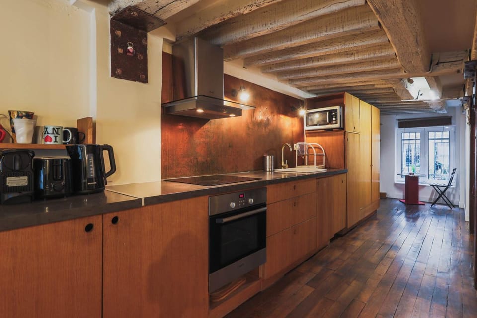 Kitchen or kitchenette, oven, stove, toaster