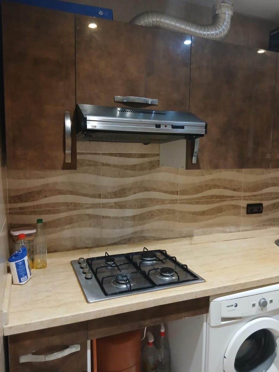 Kitchen or kitchenette, stove