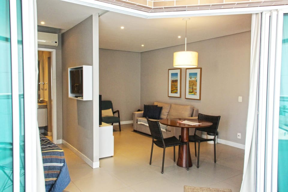 TV and multimedia, Living room, Photo of the whole room, Seating area, Dining area, air conditioner