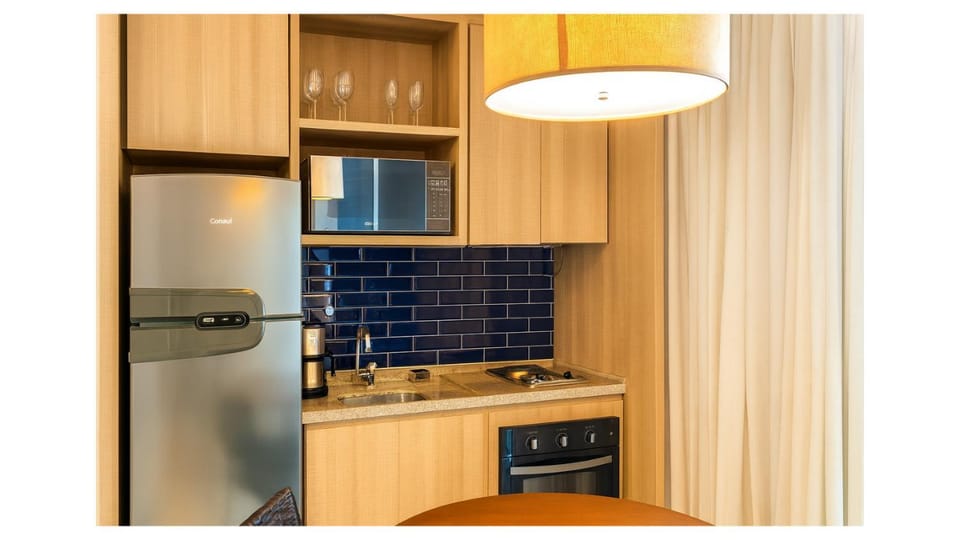 Kitchen or kitchenette, oven, stove