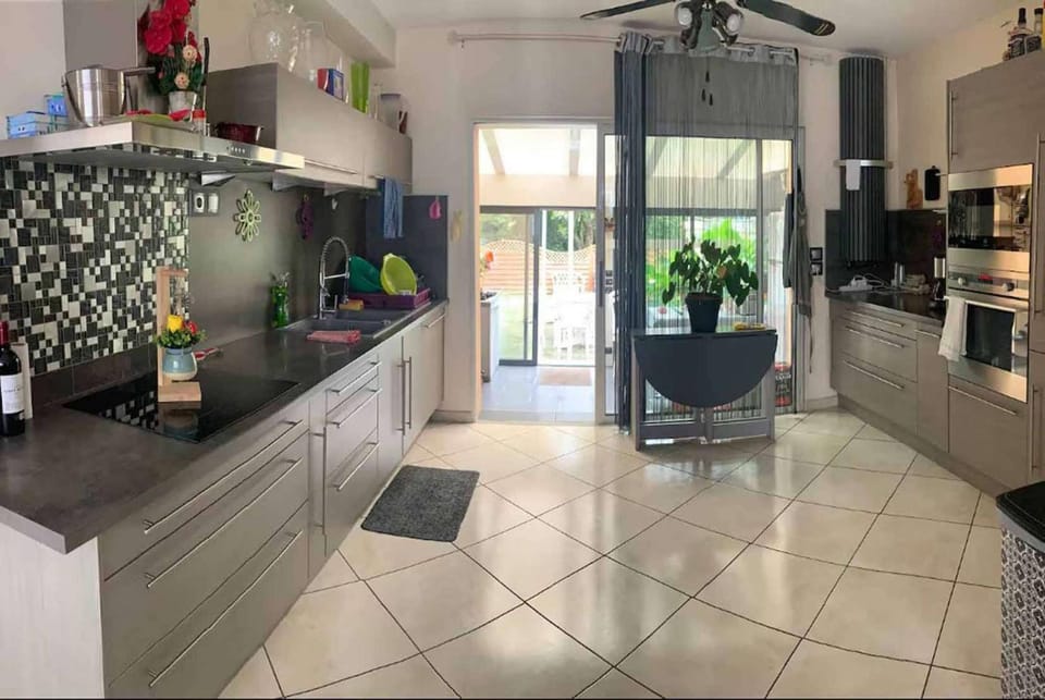 Kitchen or kitchenette, dishwasher, oven, stove