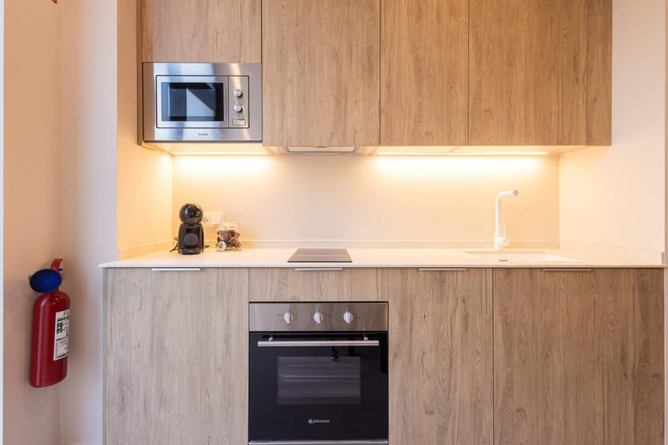 Kitchen or kitchenette, oven, stove