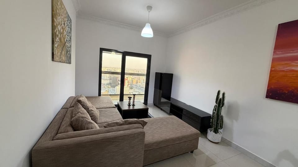 Paradise Pixels Elite 1BR Suite Sea View & pool Apartment in Ajman