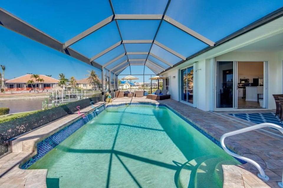 CoralVilla Sunset Cove - ping pong table, kayaks, pool, view, on water, boating House in Cape Coral